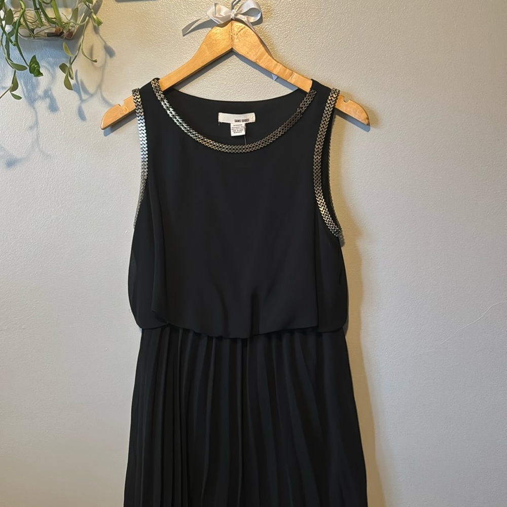 Black dress with metal embellishments